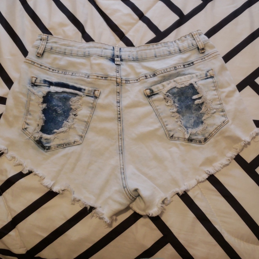 Distressed blue Jean shorts
